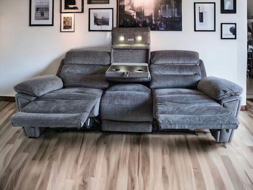 DFS Grey 3 Seater Electric Recliner Sofa with Center Console
